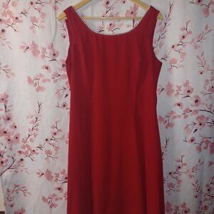 red dress adorned w Rhine stone neckline